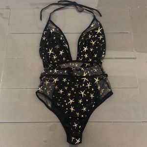 Black mesh and gold stars bodysuit